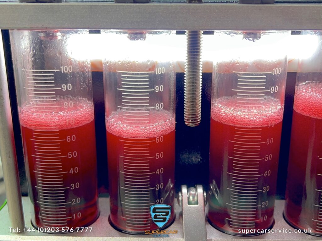 Fuel injector flow, volume and spray pattern being tested on our fuel injector test machine. The test machine accurately tests the spray and volume for each injector, clearly showing the difference between each injector and how the individual cylinder power output will be affected.